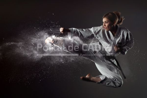 karate girl bounces and makes a kick 2021 08 27 21 36 17 utc