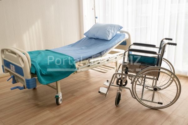 hospital bed and wheelchair at the hospital room 2021 09 03 22 31 29 utc
