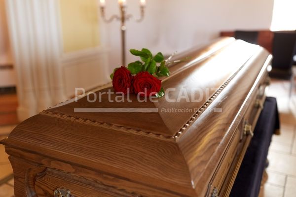 red rose flowers on wooden coffin in church 2022 12 16 09 44 13 utc
