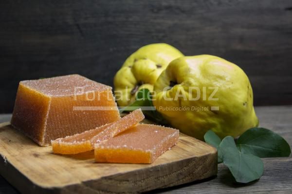 handmade quince paste and quinces on rustic wooden 2022 12 22 23 42 29 utc