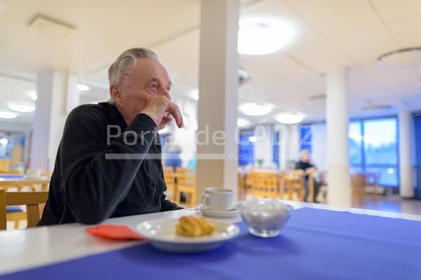 senior man eating at the cafeteria in nursing home 2021 08 27 18 18 31 utc
